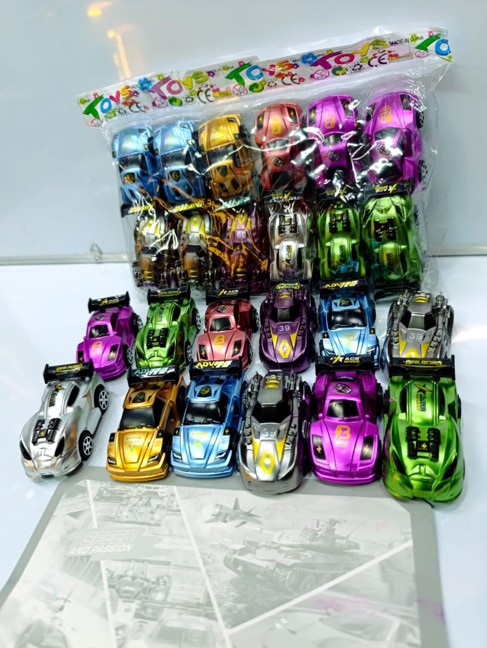 Dozen small toy cars