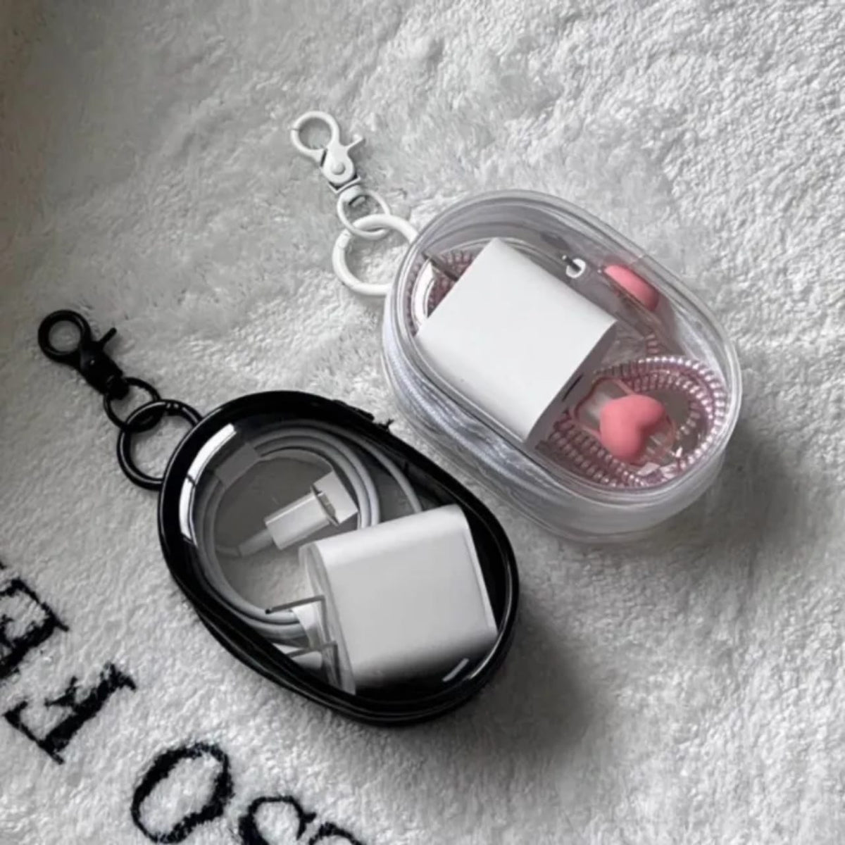 Portable Mini Transparent Multifunctional Headphone and charger case.